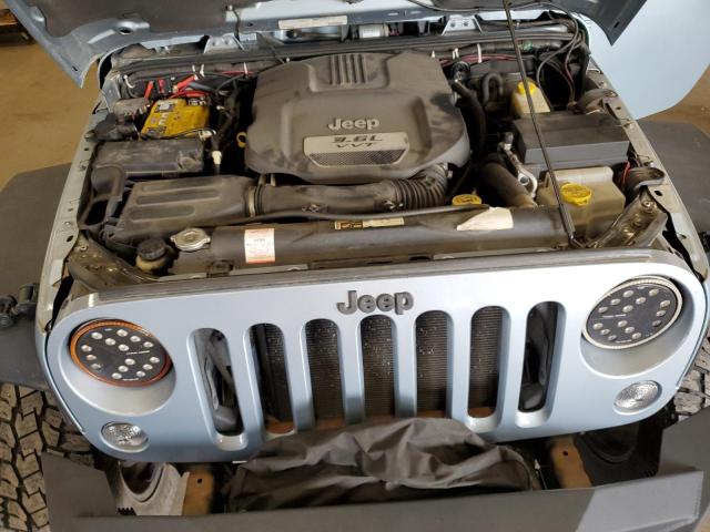 1C4BJWEG4CL162747 - 2012 JEEP WRANGLER U SAHARA ლურჯი ფოტო 11