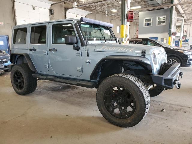 1C4BJWEG4CL162747 - 2012 JEEP WRANGLER U SAHARA ლურჯი ფოტო 4