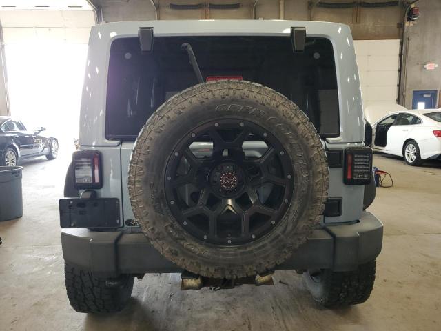 1C4BJWEG4CL162747 - 2012 JEEP WRANGLER U SAHARA ლურჯი ფოტო 6