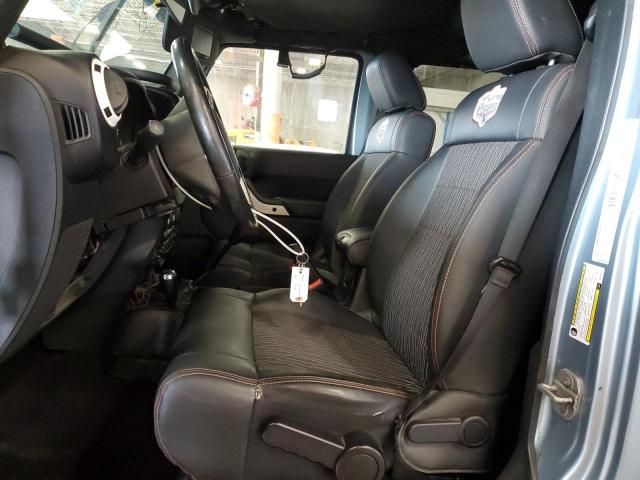 1C4BJWEG4CL162747 - 2012 JEEP WRANGLER U SAHARA ლურჯი ფოტო 7