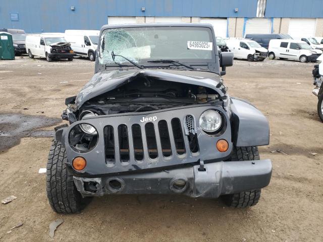 1C4BJWEG2CL141749 - 2012 JEEP WRANGLER U SAHARA 黑色 照片 5