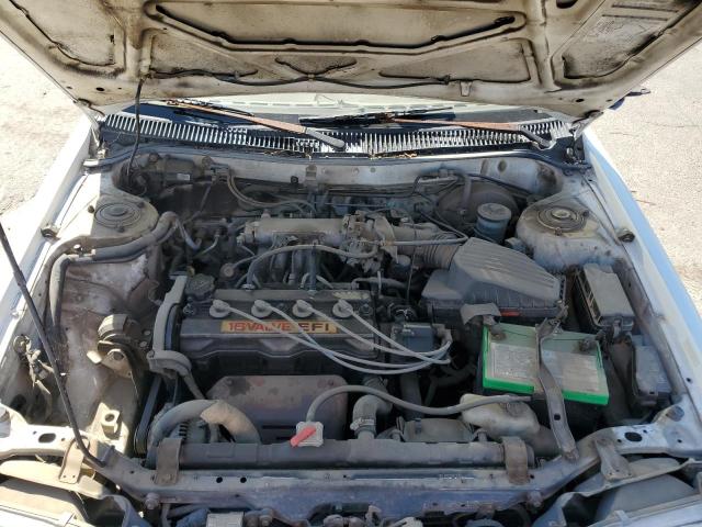 1Y1SK5468LZ128853 - 1990 GEO PRIZM BASE WHITE photo 11