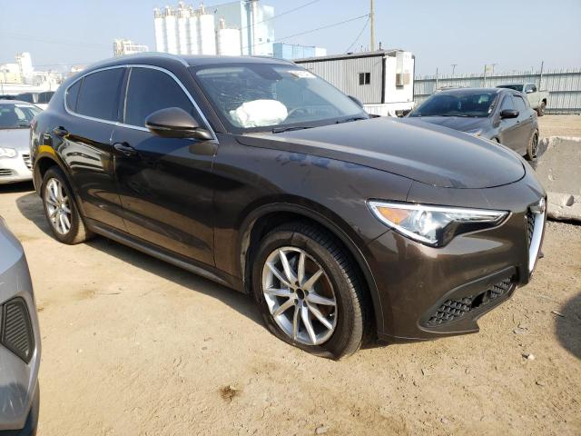 ZASFAKBNXJ7B87467 - 2018 ALFA ROMEO STELVIO TI BROWN photo 4
