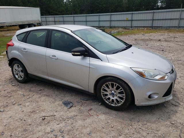 1FAHP3M2XCL210691 - 2012 FORD FOCUS SEL SILVER photo 4