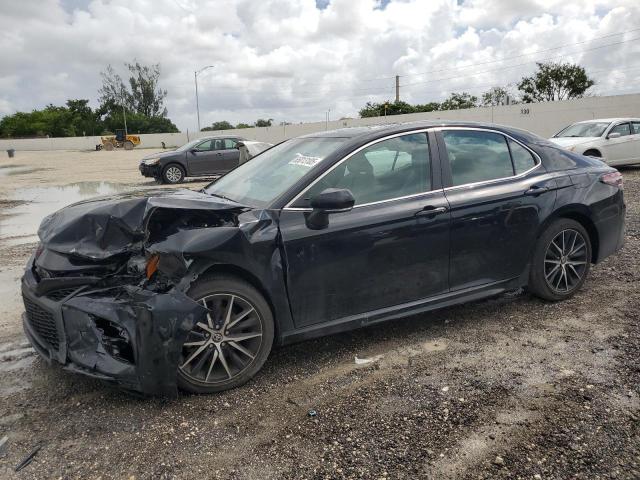 4T1G11AK4RU921043 - 2024 TOYOTA CAMRY SE NIGHT SHADE BLACK photo 1