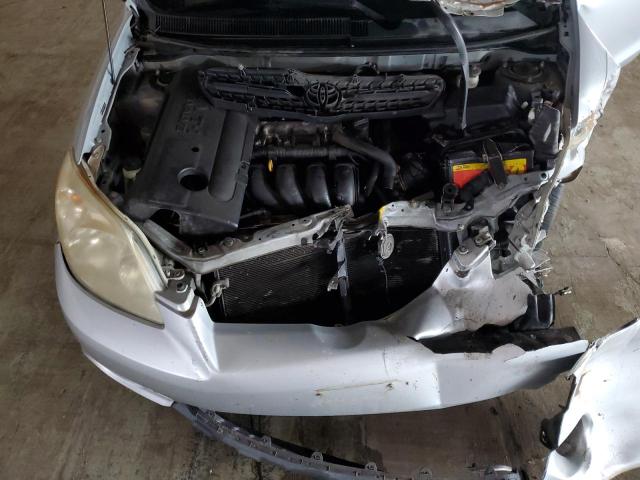 2T1KR32E07C638497 - 2007 TOYOTA COROLLA MA XR SILVER photo 11