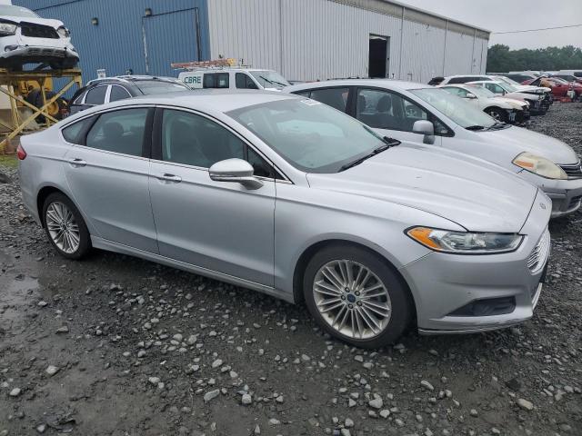 3FA6P0H92ER318210 - 2014 FORD FUSION SE SILVER photo 4