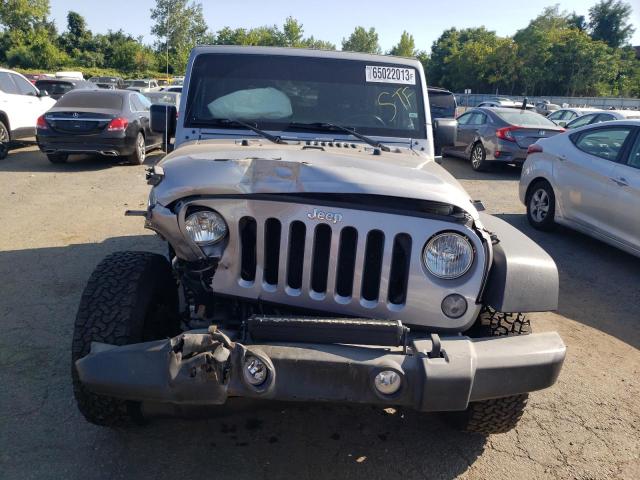 1C4AJWAG7GL135145 - 2016 JEEP WRANGLER SPORT SILVER photo 5