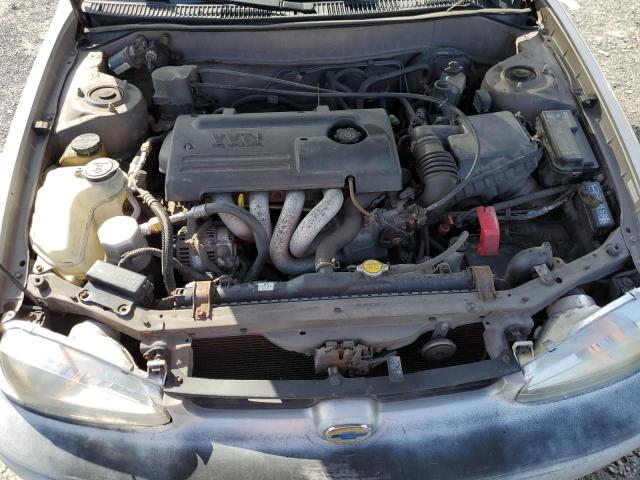 1Y1SK5283YZ428599 - 2000 CHEVROLET GEO PRIZM BASE SILVER photo 11