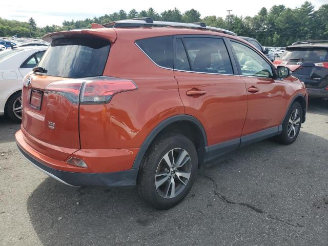 JTMRFREV4GJ074329 - 2016 TOYOTA RAV4 XLE ORANGE photo 3