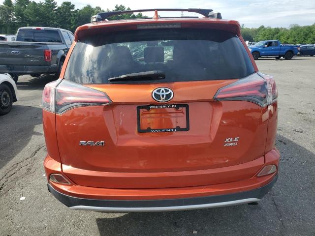 JTMRFREV4GJ074329 - 2016 TOYOTA RAV4 XLE ORANGE photo 6