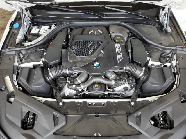 WBAFY4C02MCG01002 - 2021 BMW M850XI WHITE photo 11