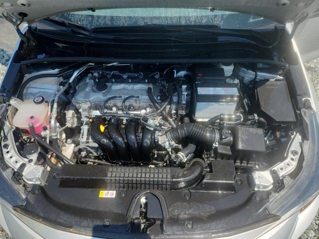 5YFEPMAE6NP336123 - 2022 TOYOTA COROLLA LE SILVER photo 11