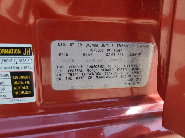 KL1TD566X6B618263 - 2006 CHEVROLET AVEO BASE RED photo 12