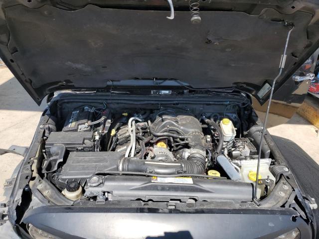 1C4BJWEG7CL130567 - 2012 JEEP WRANGLER U SAHARA BLACK photo 11