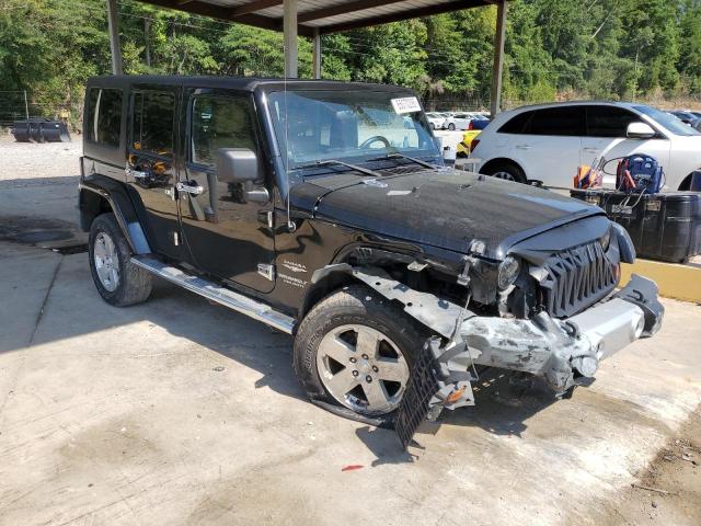 1C4BJWEG7CL130567 - 2012 JEEP WRANGLER U SAHARA BLACK photo 4