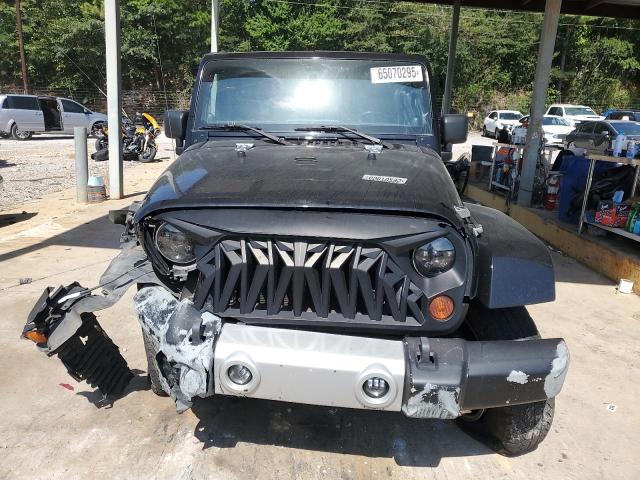 1C4BJWEG7CL130567 - 2012 JEEP WRANGLER U SAHARA BLACK photo 5