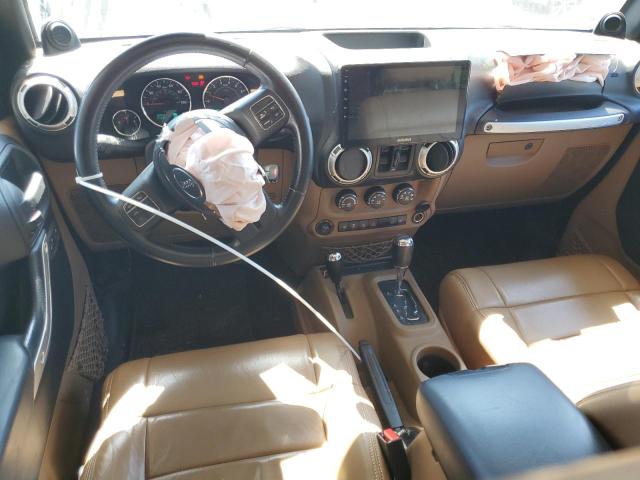 1C4BJWEG7CL130567 - 2012 JEEP WRANGLER U SAHARA BLACK photo 8