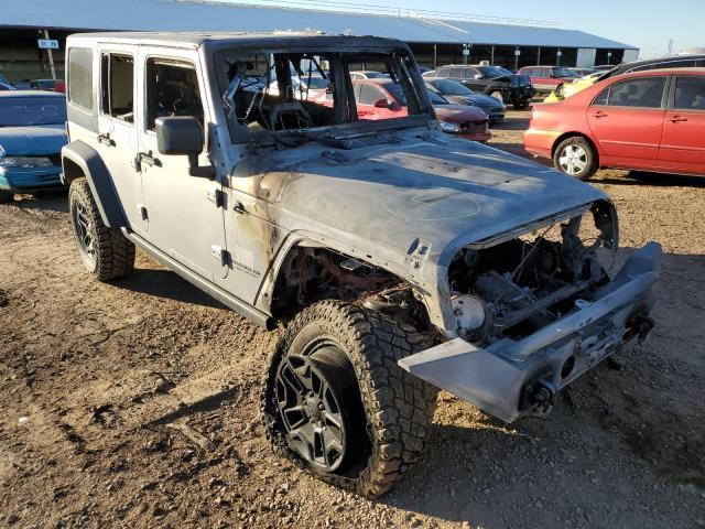 1C4BJWDG9GL235733 - 2016 JEEP WRANGLER U SPORT ვერცხლისფერი ფოტო 1
