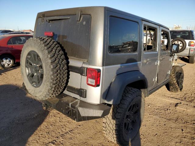 1C4BJWDG9GL235733 - 2016 JEEP WRANGLER U SPORT ვერცხლისფერი ფოტო 4