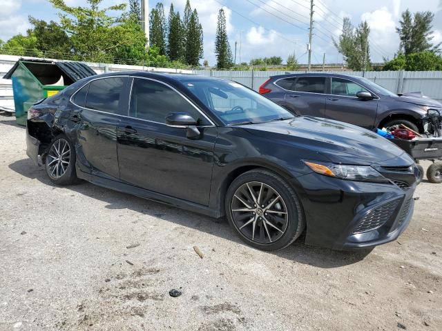 4T1S11AK2RU239725 - 2024 TOYOTA CAMRY SE NIGHT SHADE BLACK photo 4