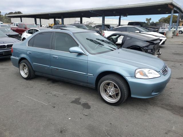 1HGEJ8647XL055566 - 1999 HONDA CIVIC EX BLUE photo 4