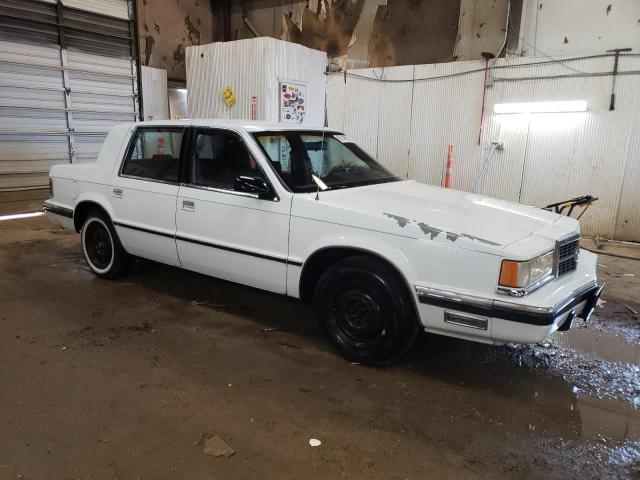 1B3BC463XKD622594 - 1989 DODGE DYNASTY WHITE photo 4