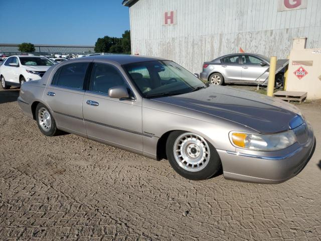 1LNHM81W4XY709515 - 1999 LINCOLN TOWN CAR EXECUTIVE Beige Foto 4