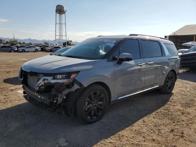 KNDNE5H36P6198321 - 2023 KIA CARNIVAL SX GRAY photo 1