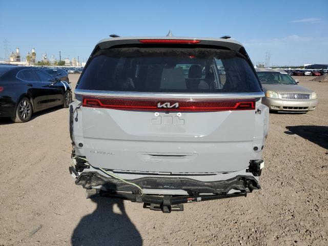 KNDNE5H36P6198321 - 2023 KIA CARNIVAL SX GRAY photo 6