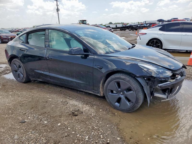 5YJ3E1EA9PF563761 - 2023 TESLA MODEL 3 BLACK photo 4
