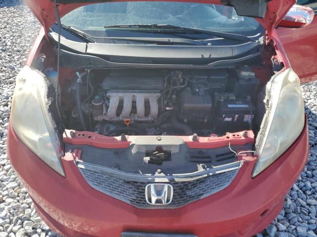 JHMGE884X9S011478 - 2009 HONDA FIT SPORT RED photo 11