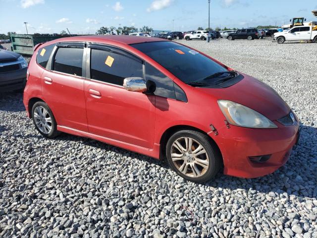 JHMGE884X9S011478 - 2009 HONDA FIT SPORT RED photo 4