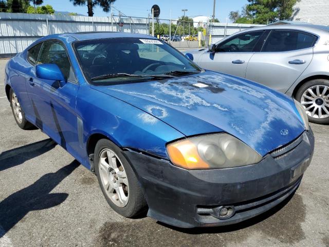 KMHHM65D14U143555 - 2004 HYUNDAI TIBURON BLUE photo 4