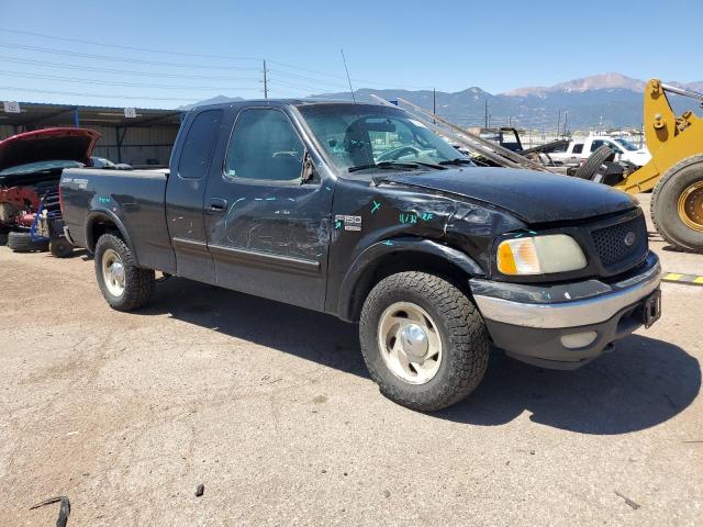 1FTRX18LX1NC04106 - 2001 FORD F150 Қара фото 4