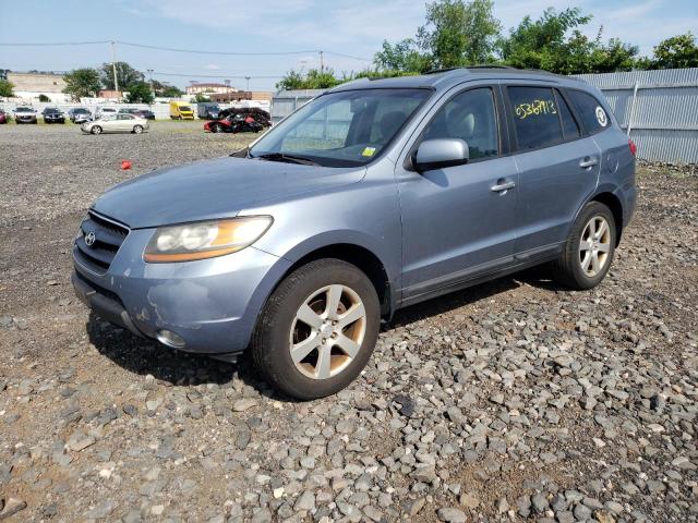 5NMSH13E39H230949 - 2009 HYUNDAI SANTA FE SE BLUE photo 1