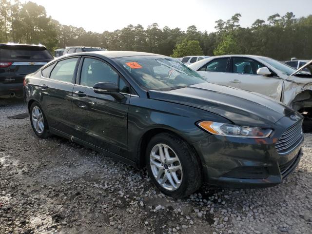 3FA6P0H73FR150688 - 2015 FORD FUSION SE GREEN photo 4