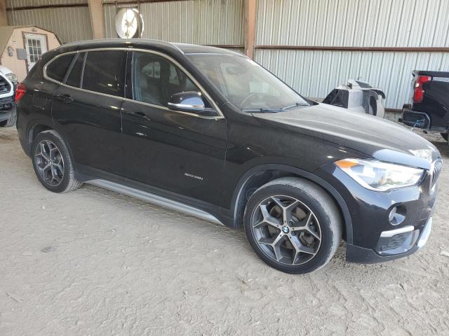 WBXHT3Z35H4A65753 - 2017 BMW X1 XDRIVE28I BLACK photo 4