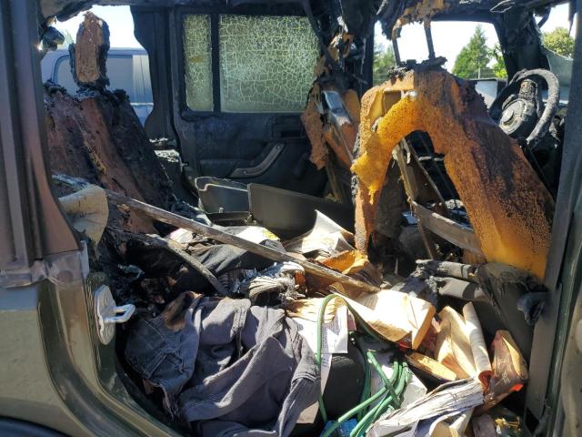 1C4BJWDG6FL751479 - 2015 JEEP WRANGLER U SPORT Зелений фото 11