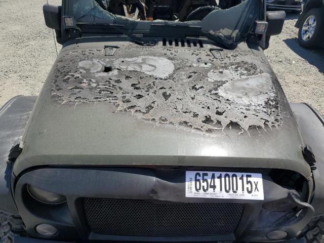 1C4BJWDG6FL751479 - 2015 JEEP WRANGLER U SPORT Зелений фото 12