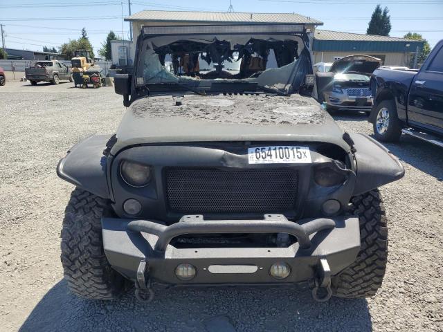 1C4BJWDG6FL751479 - 2015 JEEP WRANGLER U SPORT Зелений фото 5