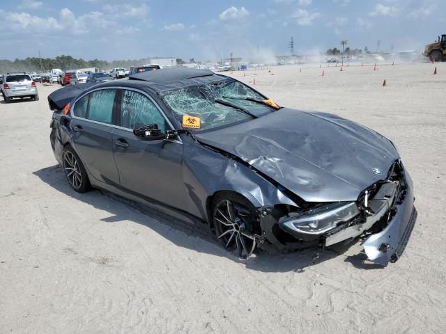 3MW5R7J05N8C71892 - 2022 BMW 330XI GRAY photo 4