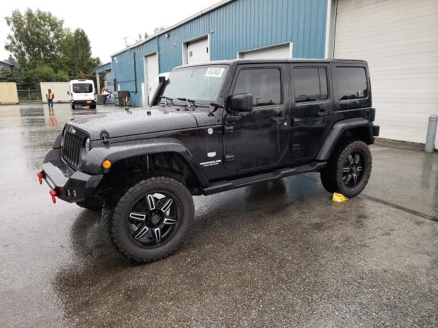 1J4HA7H13BL576408 - 2011 JEEP WRANGLER U JEEP 70TH ANNIVERSARY BLACK photo 1