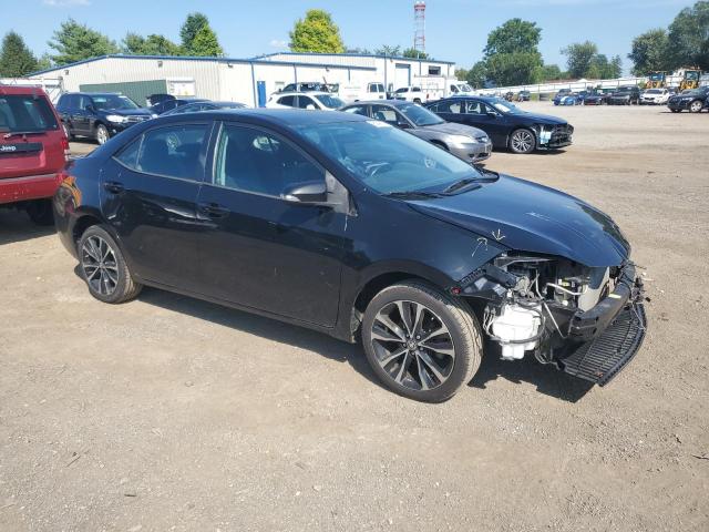 2T1BURHE9HC822024 - 2017 TOYOTA COROLLA L BLACK photo 4