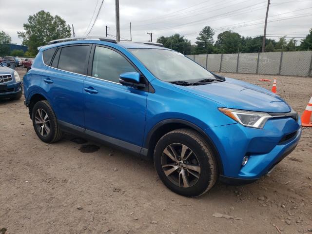 2T3RFREV8JW786738 - 2018 TOYOTA RAV4 ADVENTURE BLUE photo 4