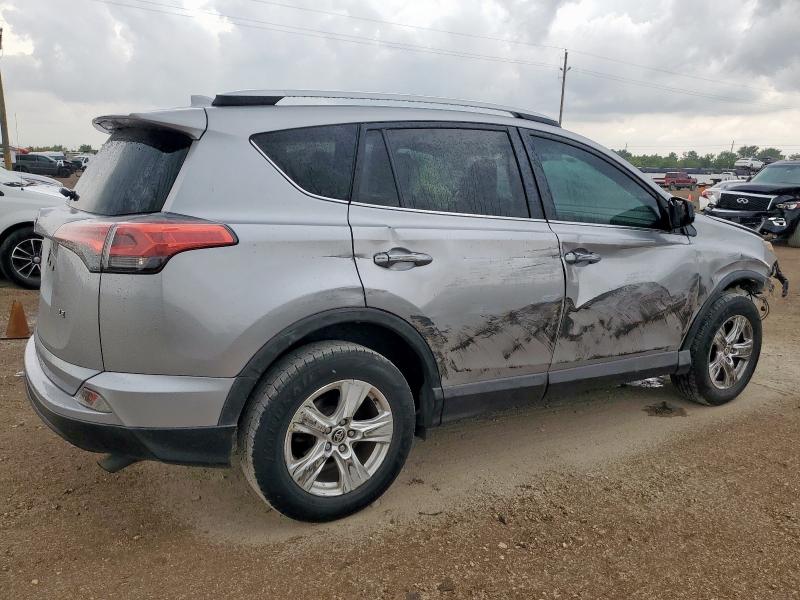 2T3ZFREV4GW282261 - 2016 TOYOTA RAV4 LE SILVER photo 3
