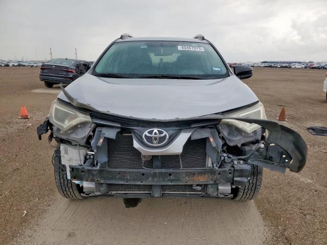 2T3ZFREV4GW282261 - 2016 TOYOTA RAV4 LE SILVER photo 5