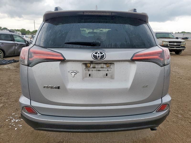 2T3ZFREV4GW282261 - 2016 TOYOTA RAV4 LE SILVER photo 6
