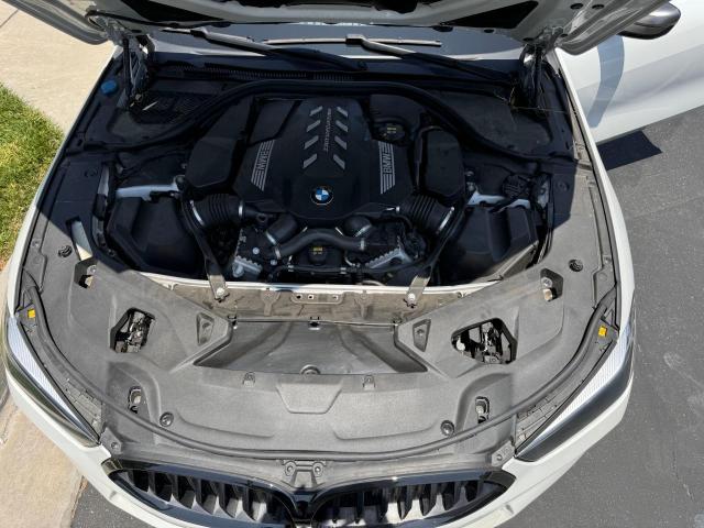 WBAGV8C01LBP48613 - 2020 BMW M850XI WHITE photo 7