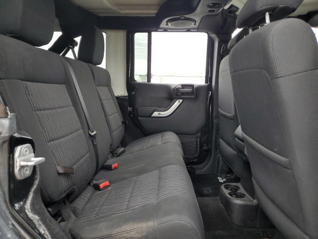 1C4BJWEG8CL217202 - 2012 JEEP WRANGLER U SAHARA BLACK photo 11